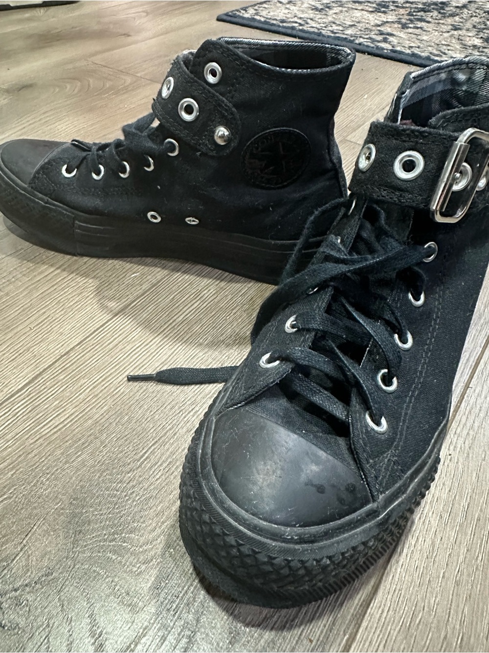Converse Black High-Top Canvas Sneaker with Silver Eyelets